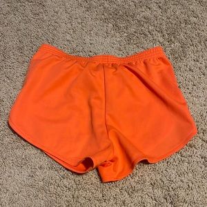 American Apparel short shorts in orange
